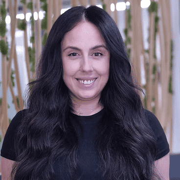 Portrait of Lilit, a professional stylist at Tangles Salon, showcasing their expertise and style.